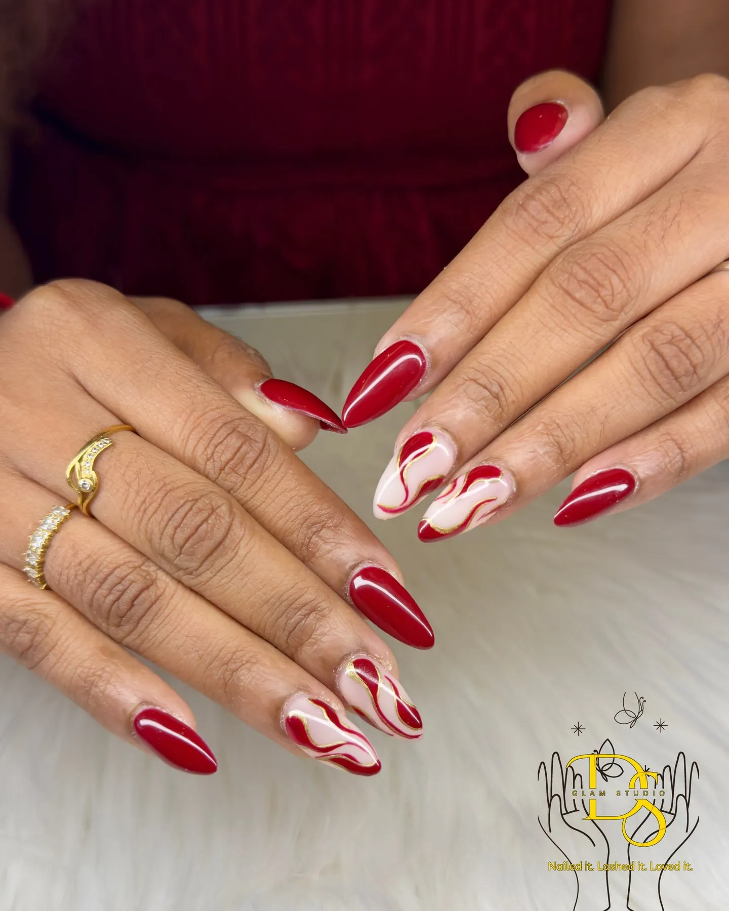 Red swirl nail art