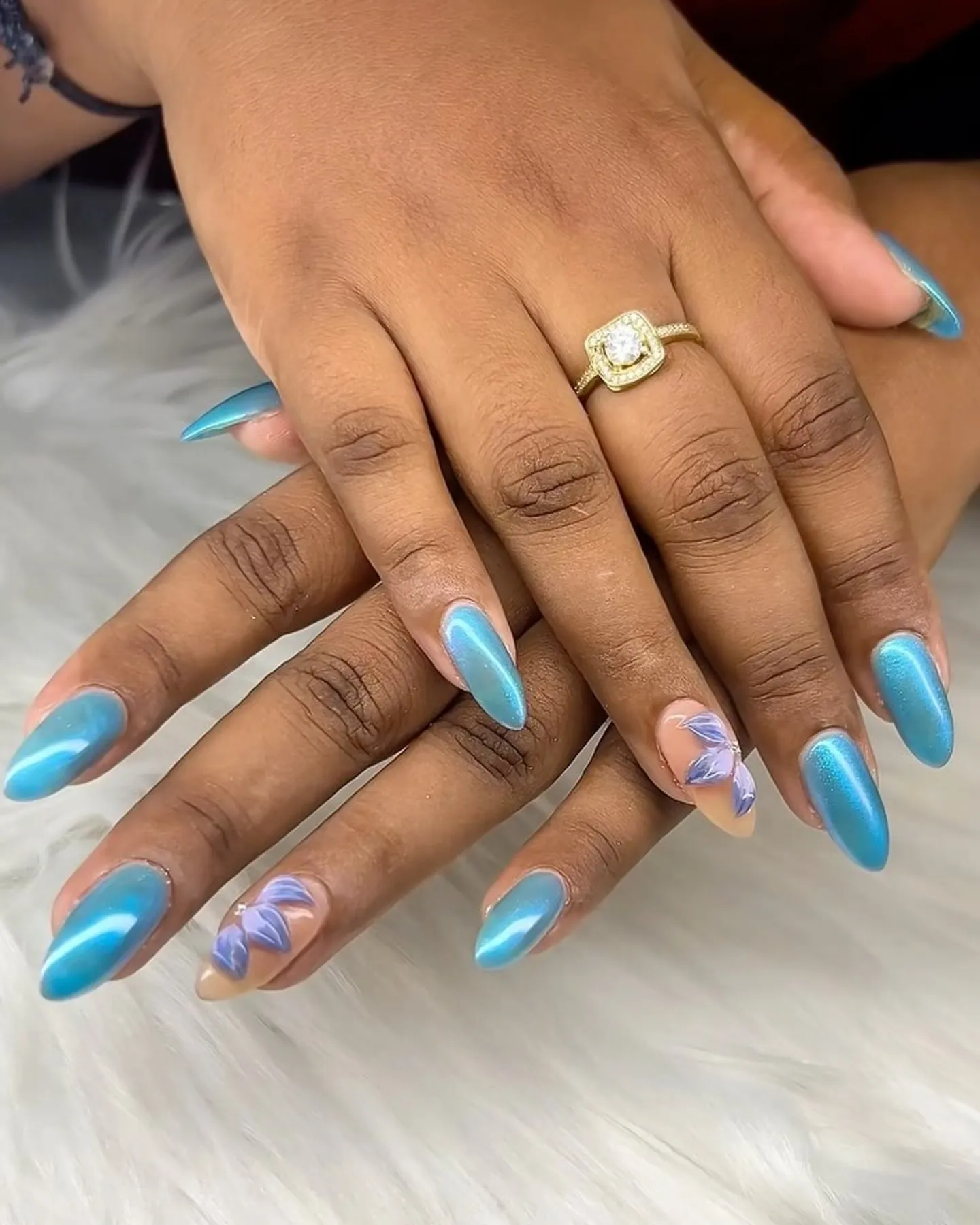 Turquoise chrome nails